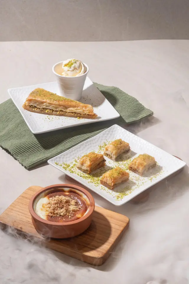 Pistachio baklava, carrot-slice baklava and sütlaç rice pudding