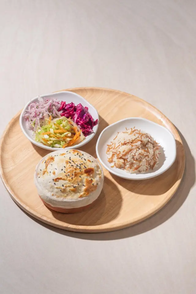 Beef, chicken and vegetable güveç casseroles in clay dishes