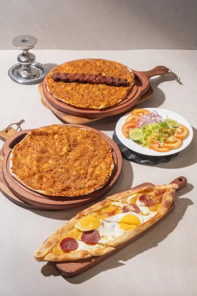Lahmacun and LahAdana with Adana kebab skewer, served with herbs
