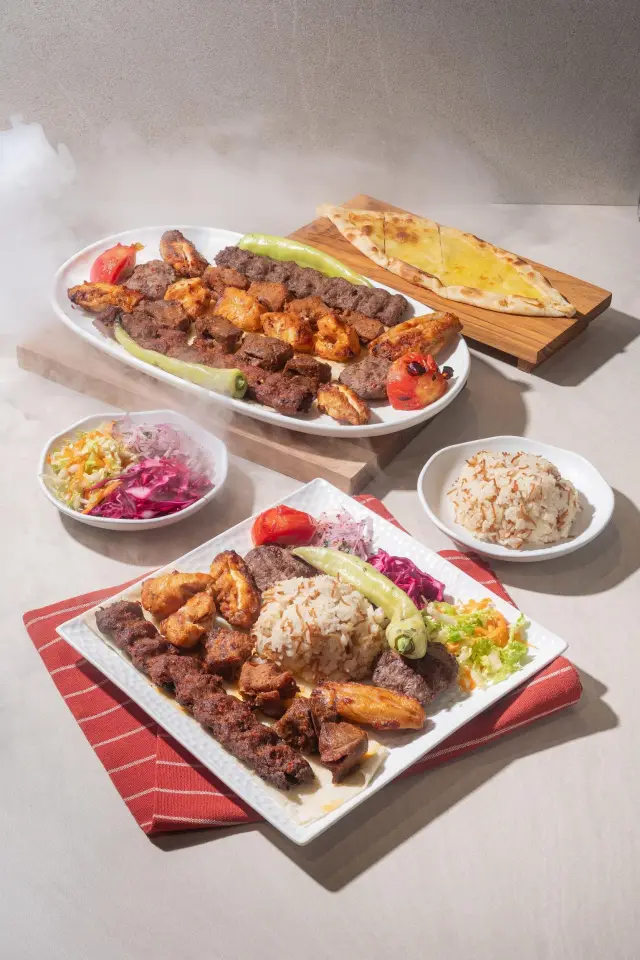 Mixed kebab platter with köfte, shish, wings and grilled vegetables