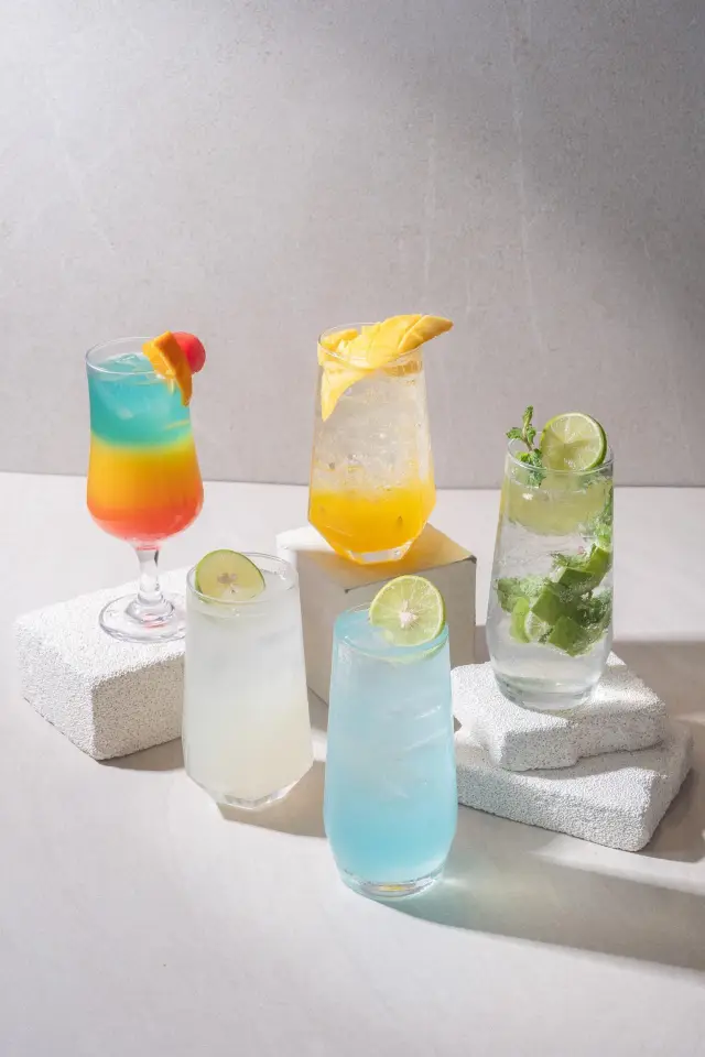 Colourful mocktails including Mojito and Rainbow
