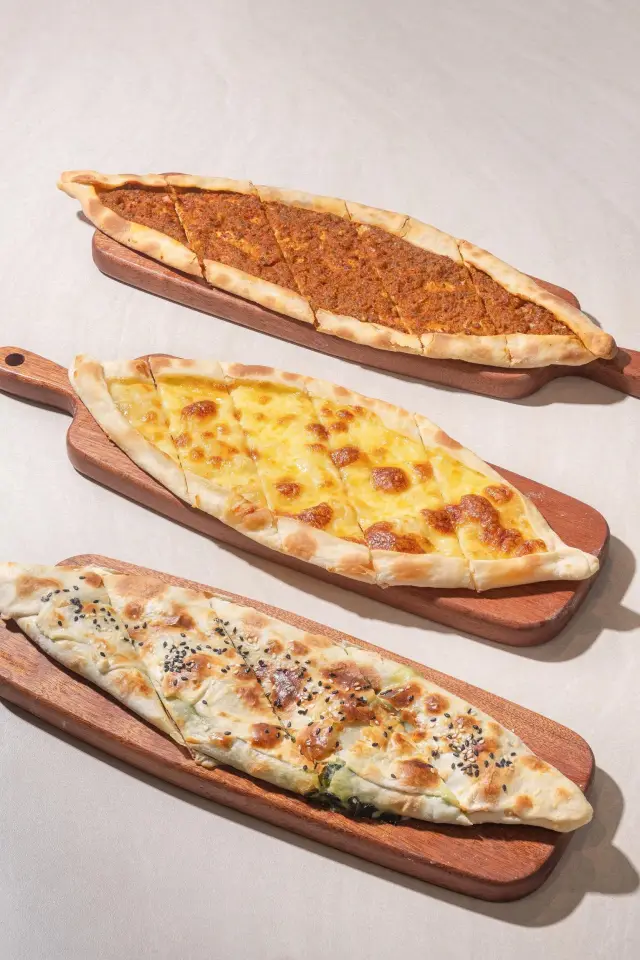 Ground beef, cheese and spinach pide fresh from the stone oven