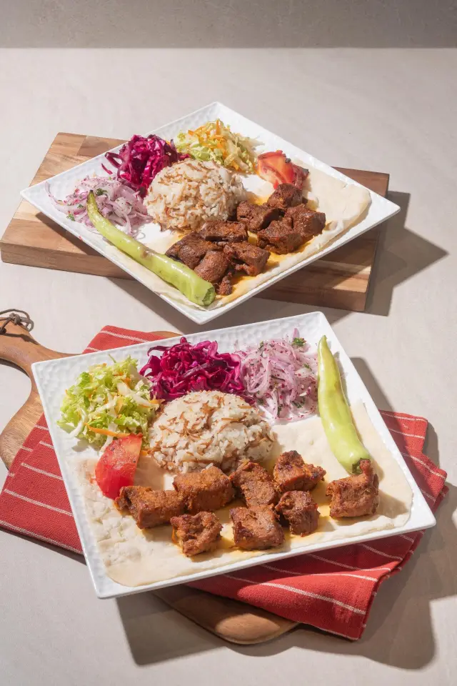 Beef and lamb shish skewers grilled over charcoal
