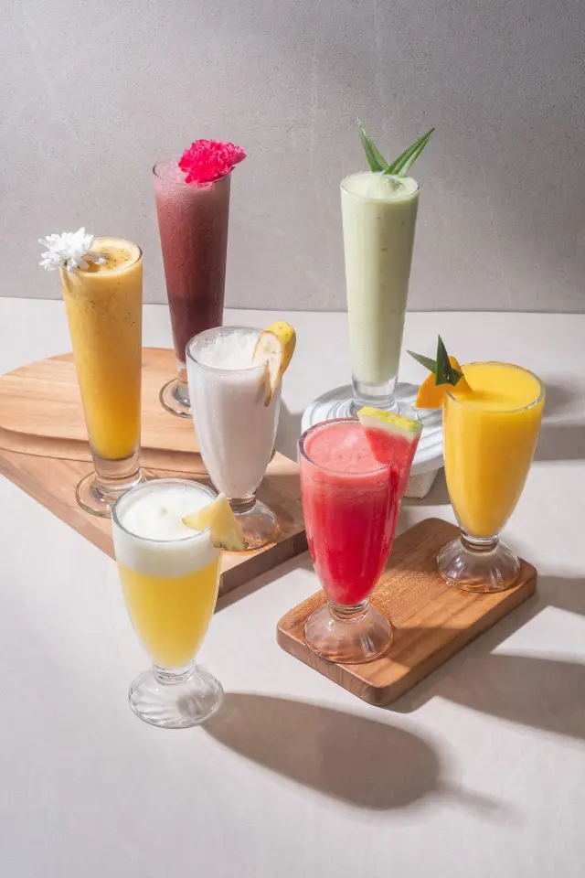 Fresh fruit smoothies with watermelon, mango and berries